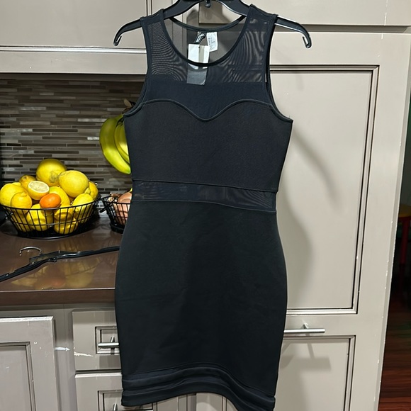 Divided Dresses & Skirts - Brand new with tags! Black cocktail dress with sheer panels